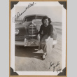 Yuchi posing with a car (ddr-densho-542-341)