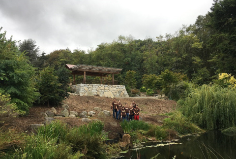 Group of volunteers from UPS in front of Kubota Terrace Overlook (ddr-densho-354-2534)