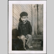 Boy wearing a cap sitting (ddr-densho-483-538)