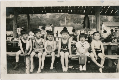 Children at a picnic on the beach (ddr-densho-321-731)