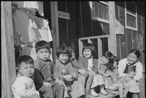 Children outside barracks (ddr-densho-37-612)