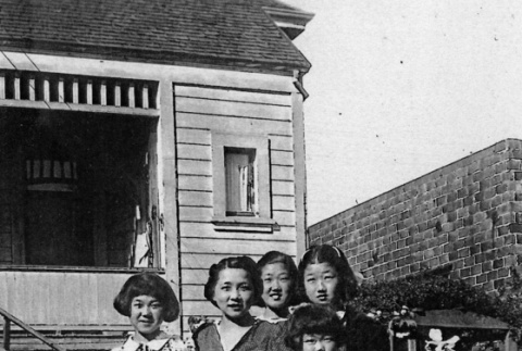 Five girls in garden outside house (ddr-ajah-6-876)