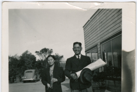 Two people outside an office (ddr-densho-329-805)
