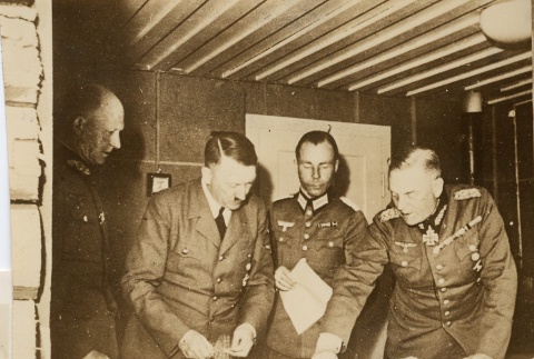 Adolf Hitler discussing strategy with Nazi leaders (ddr-njpa-1-664)