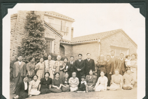 Group photo outside large house (ddr-densho-483-378)