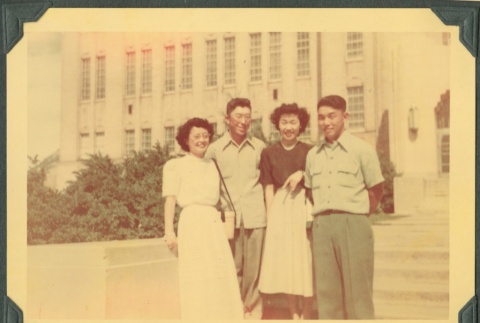 Friends in front of a building (ddr-densho-328-203)