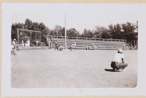 Photo of men playing baseball after working at farm (ddr-densho-379-696)