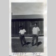 Two boys in front of barracks (ddr-manz-6-99)