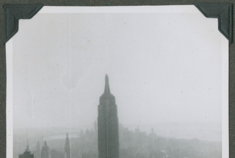A man and woman looking at the Empire State Building (ddr-densho-201-770)