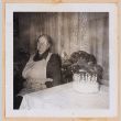 Photo of an elderly woman with a cake (ddr-densho-483-484)