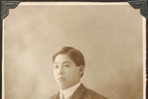 Portrait of Nikkei man in a suit (ddr-densho-259-423)