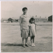 A Japanese American woman and girl pose for camera (ddr-densho-362-5)