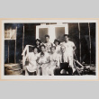 Chimata and Masako Sumida family in front of barracks (ddr-densho-379-663)