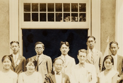 Ernest Shinkaku Hunt posing with young congregants (ddr-njpa-2-446)