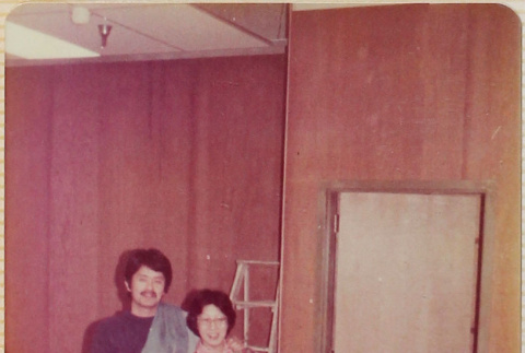 Man and woman behind desk (ddr-densho-426-1240)