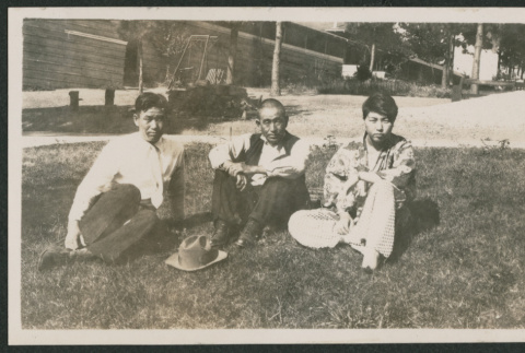 3 men sitting in a yard (ddr-densho-378-831)