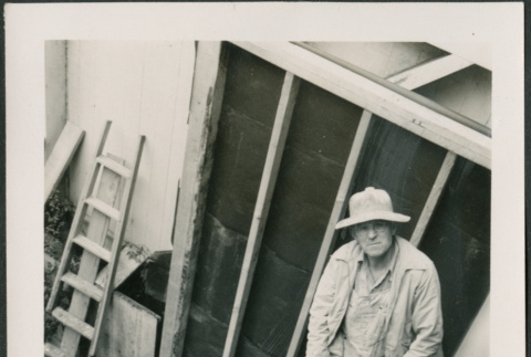 Man standing on ladder (ddr-densho-426-2250)