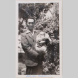 Man holding baby (ddr-densho-464-132)