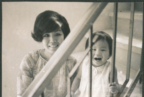 Woman and toddler on stairway (ddr-densho-523-498)