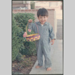Boy with Easter basket (ddr-densho-523-426)