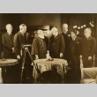 Men at the American Economic Mission (ddr-njpa-1-377)