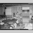 Japanese American inside barracks (ddr-densho-37-485)