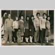 Sumida family portrait in front of barracks at Rohwer Relocation Center (ddr-densho-379-399)
