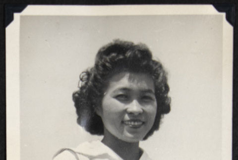Woman in a striped pinafore (ddr-densho-542-731)
