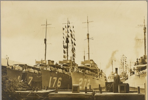 Navy ships lined up in a dock (ddr-njpa-13-394)