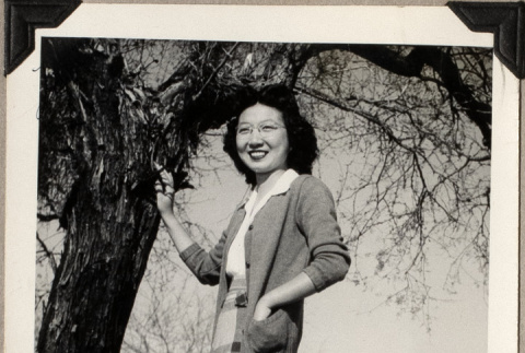 Woman standing by tree (ddr-densho-587-50)