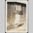 Girl in front of barracks (ddr-densho-298-44)