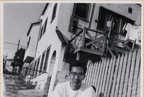 Hardy Shiomi outside house (ddr-densho-522-295)