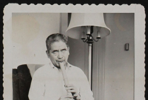 Playing a recorder (ddr-densho-287-560)