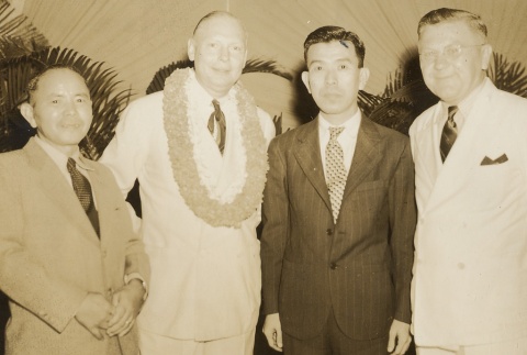 Four men posing for a photograph (ddr-njpa-1-2446)