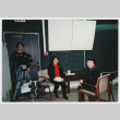 Dana Hoshide and Alice Ito in production room with narrator (ddr-densho-506-77)