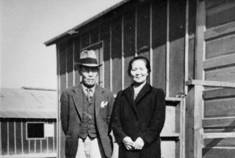 Hyakutaro and Yoshi Towata standing on steps of barracks (ddr-ajah-6-240)