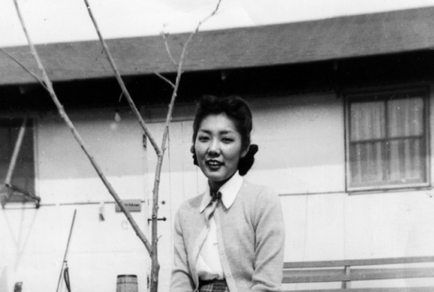 Chieko Kono sitting on bench (ddr-ajah-6-345)