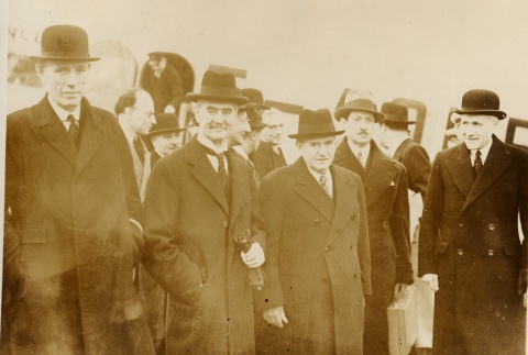 Neville Chamberlain Halifax, Corbin, and Daladier at an airport (ddr-njpa-1-20)