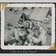 Four men by small tent (ddr-densho-434-79)