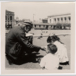 Man with children (ddr-densho-426-118)