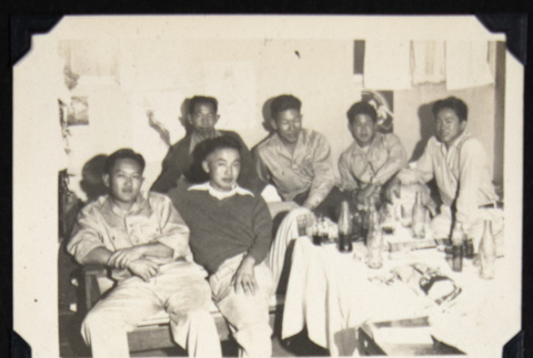 Group of men around a table (ddr-densho-542-634)
