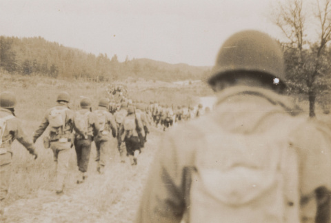 Soldiers walking in formation (ddr-janm-17-20)