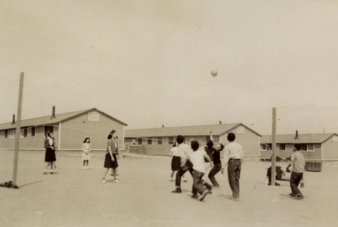 Students playing volleyball (ddr-densho-161-76)