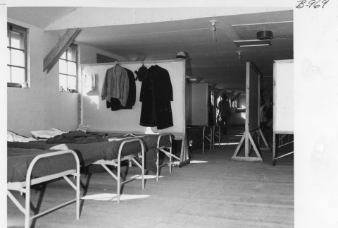 A recreation hall set up to house people transferred from Tule Lake (ddr-fom-1-913)