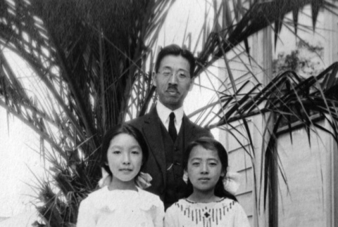 Takuritsu Morita and two students (ddr-ajah-6-600)