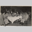 Nine men and a woman sitting at a table ato Tavern on the Green (ddr-densho-466-419)
