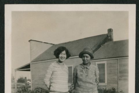 2 women in a yard (ddr-densho-378-379)
