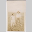 Two children in a field (ddr-densho-313-35)