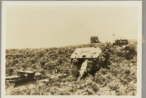 Soldiers hitching an anti-aircraft gun platform to a truck (ddr-njpa-13-1486)