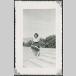 Umeyo Sakagami in front of Ogden High School (ddr-densho-328-398)